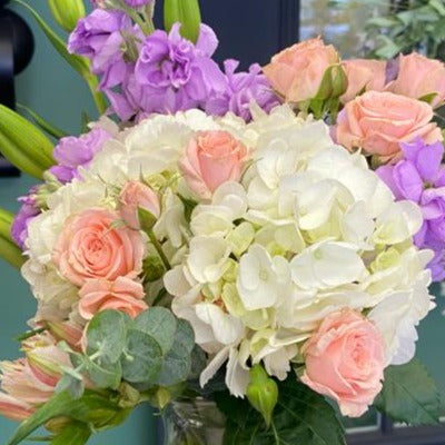 Florist designed Sympathy bouquet in a vase